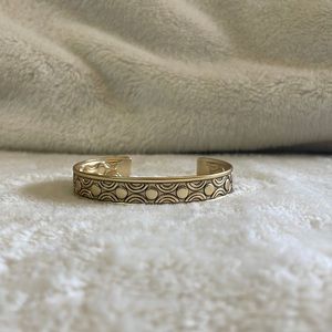 Gold tone cuff bracelet